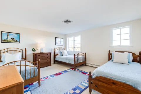 a bedroom with furniture and a couch