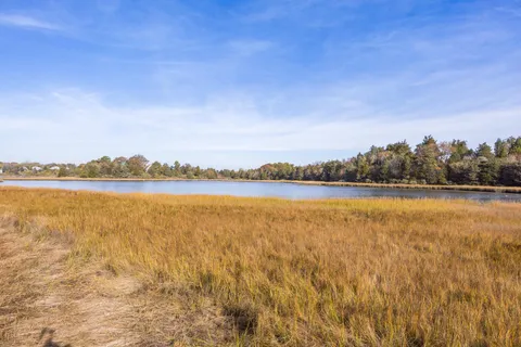 a view of an ocean and city