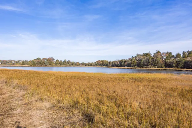 a view of an ocean and city
