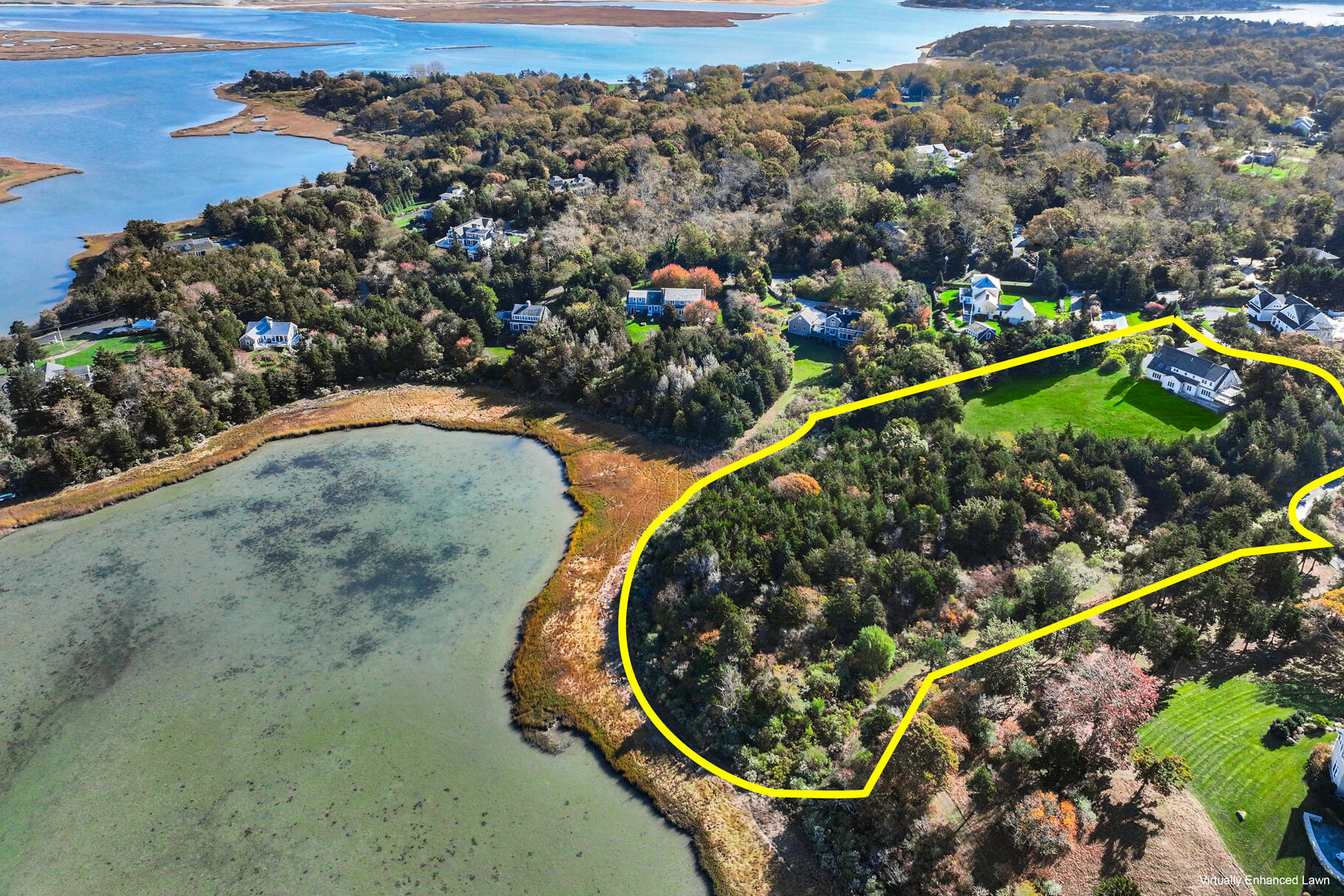 6-12 Snow Way Orleans, MA 02653 - Photo 4 of 42 an aerial view of a house with a garden and lake view