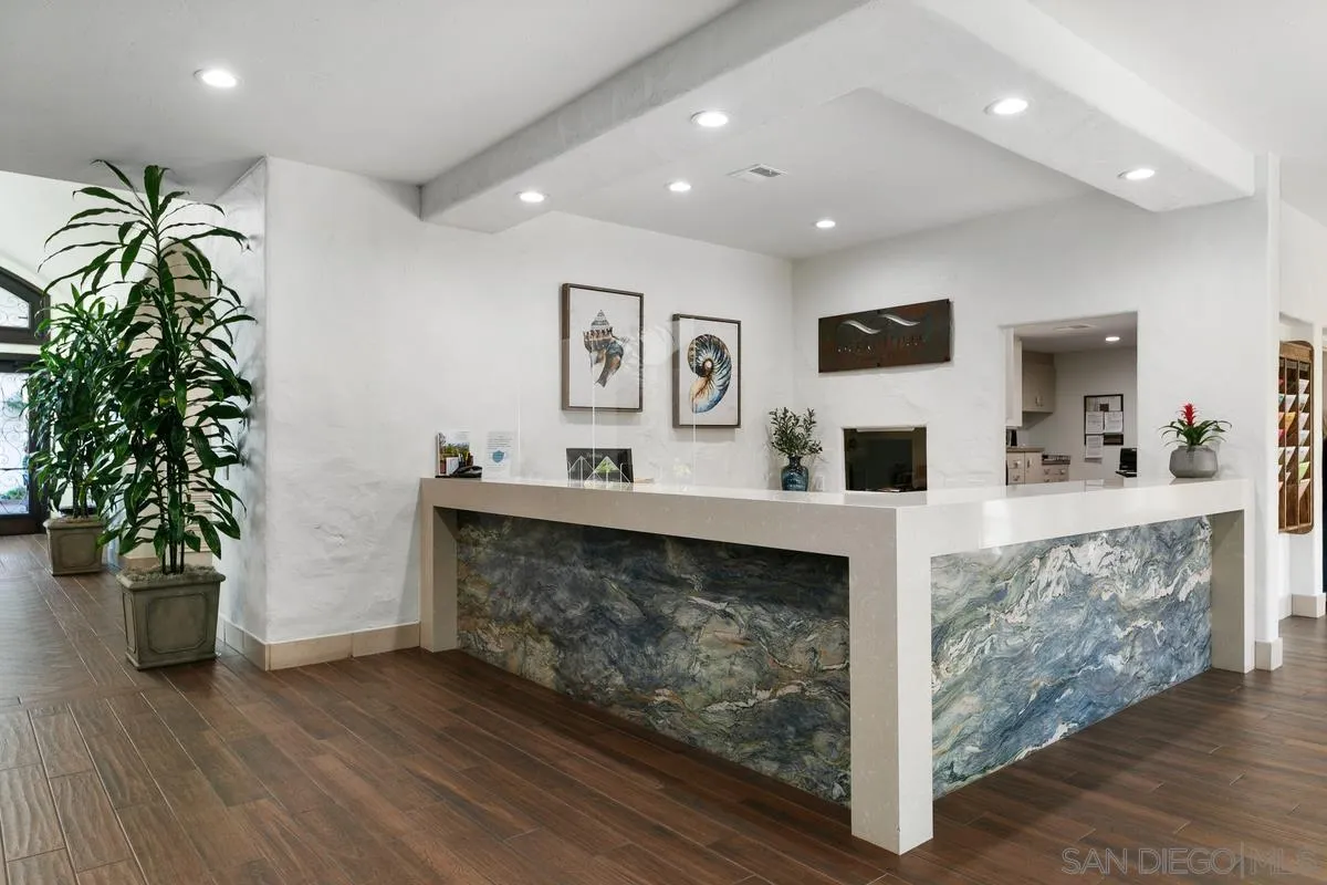 4708 Galicia Way Oceanside, CA 92056 - Photo 37 of 44 a living room with furniture and a fireplace