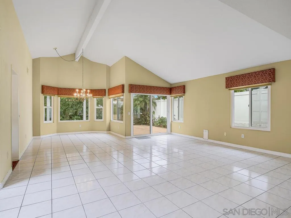 4708 Galicia Way Oceanside, CA 92056 - Photo 5 of 44 a view of an empty room with a window