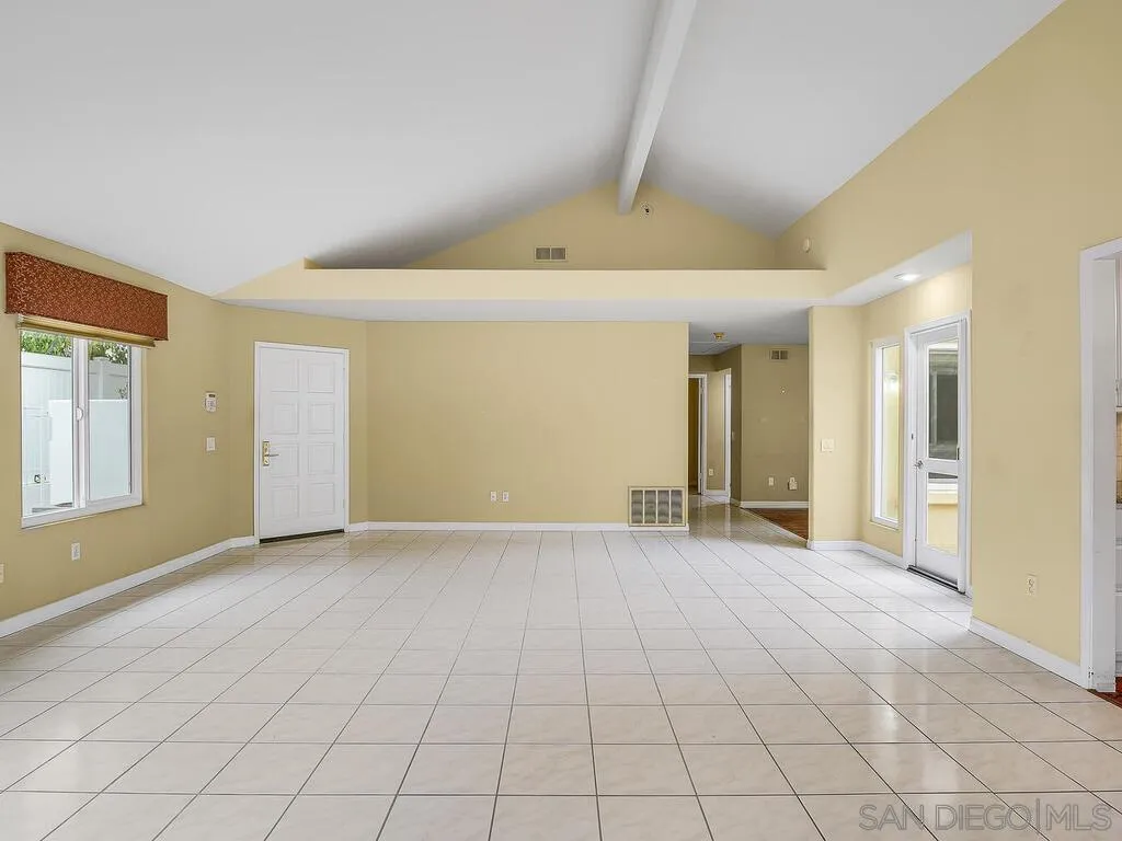 4708 Galicia Way Oceanside, CA 92056 - Photo 7 of 44 a view of an empty room and window