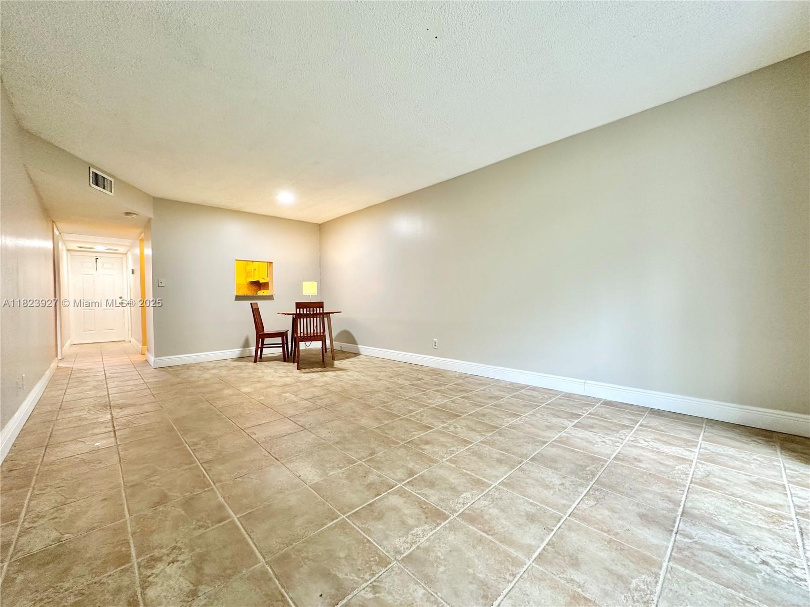 8001 Fairview Drive, Unit 107 Tamarac, FL 33321 - Photo 11 of 33 a view of a livingroom with furniture