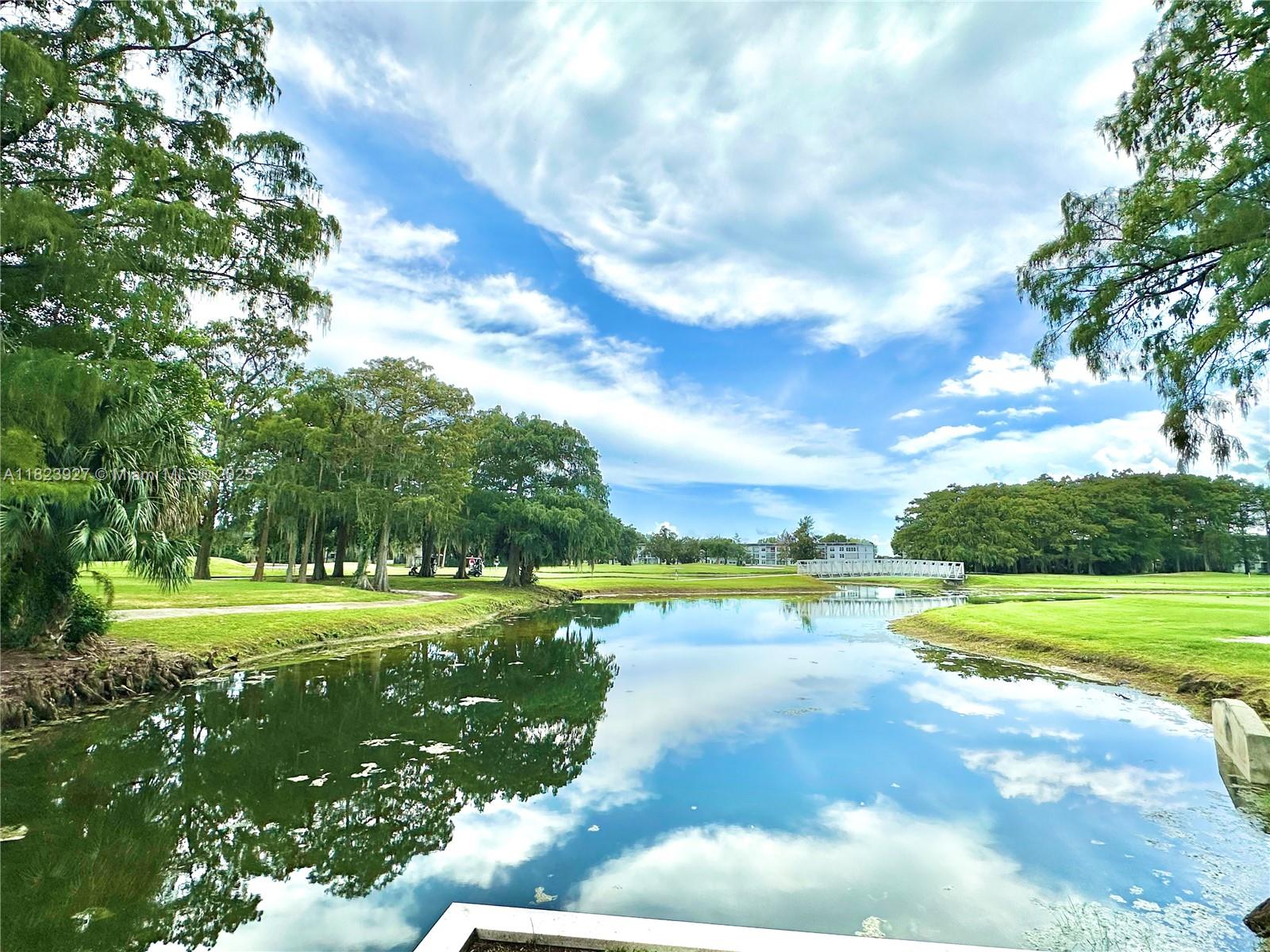 8001 Fairview Drive, Unit 107 Tamarac, FL 33321 - Photo 30 of 33 a view of a city with an trees