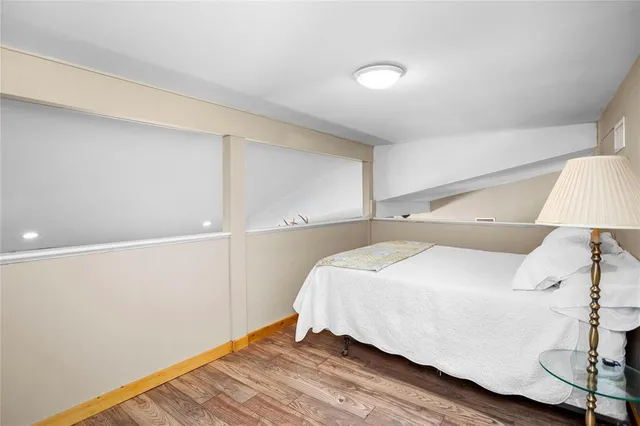 a kitchen with a refrigerator and a sink