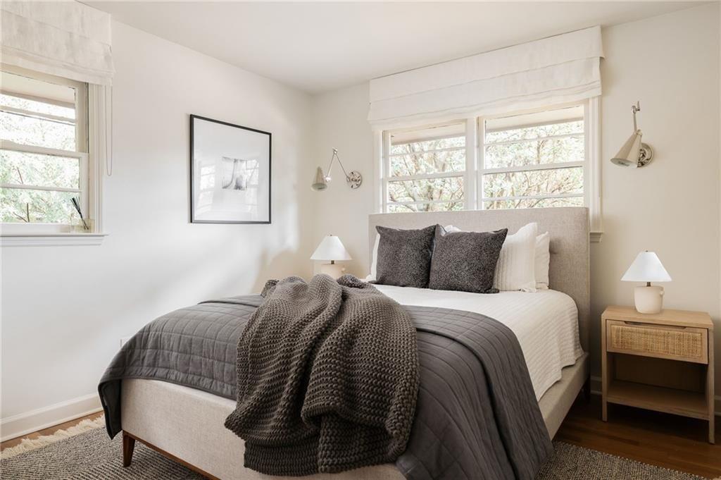 902 Cumberland Road Northeast Atlanta, GA 30306 - Photo 13 of 22 a bedroom with bed and window