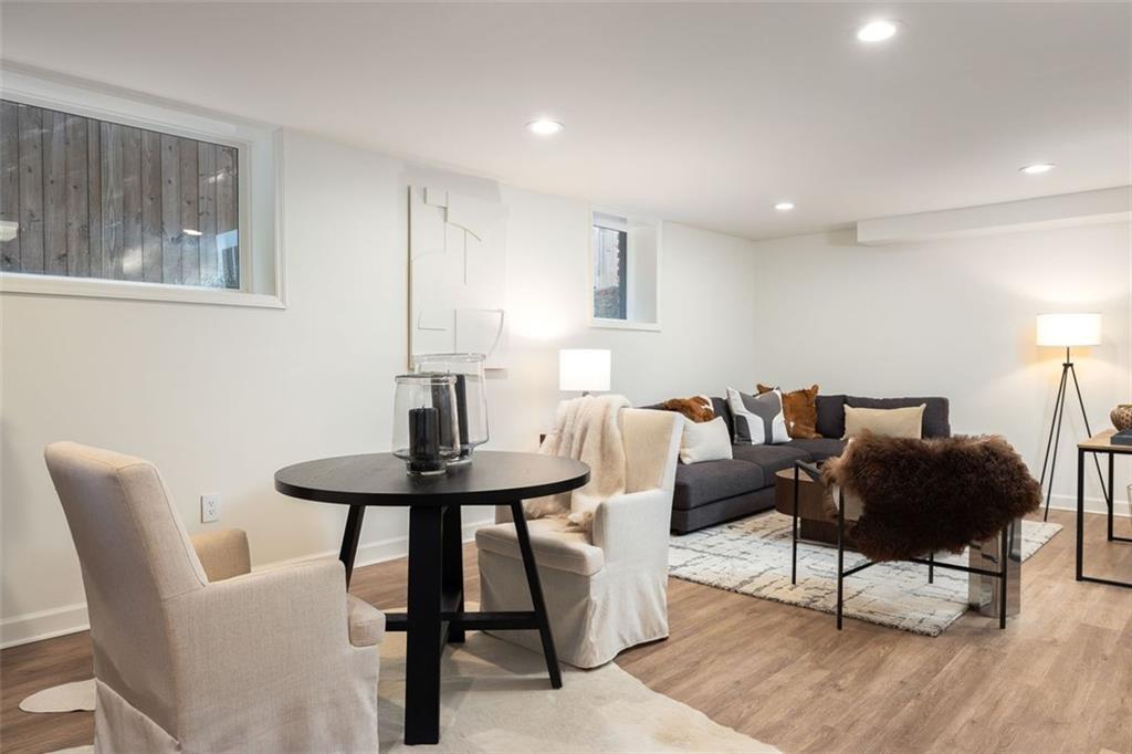 902 Cumberland Road Northeast Atlanta, GA 30306 - Photo 16 of 22 a living room with furniture a window and a table