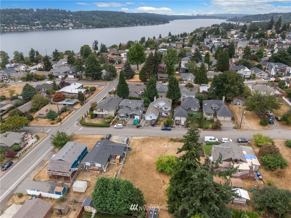 909 North 29th Street Renton, WA 98056 - Photo 4 of 12 an aerial view of a city with lake view