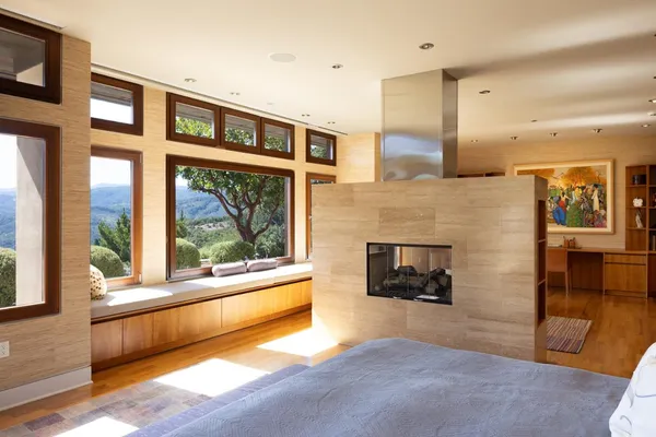 a living room with furniture and wall painting
