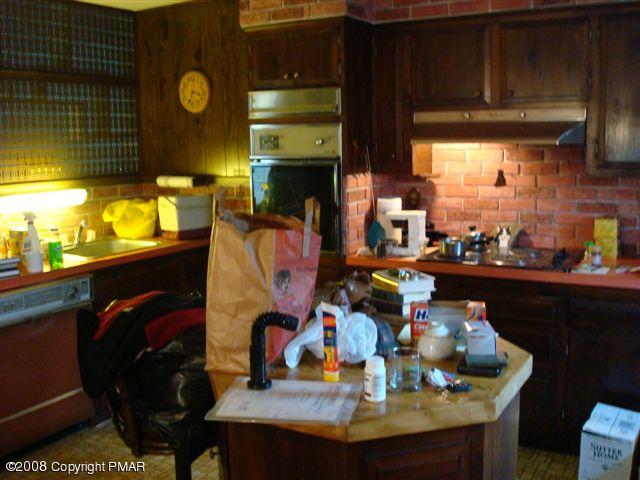82 Carlton Road Mount Pocono, PA 18344 - Photo 7 of 8 a kitchen with a sink appliances and cabinets