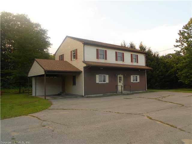 385 Killingly Road Pomfret, CT 06259 - Photo 1 of 1 a front view of a house with yard