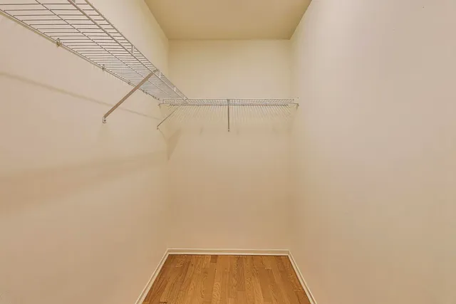 a view of a room with racks on the wall