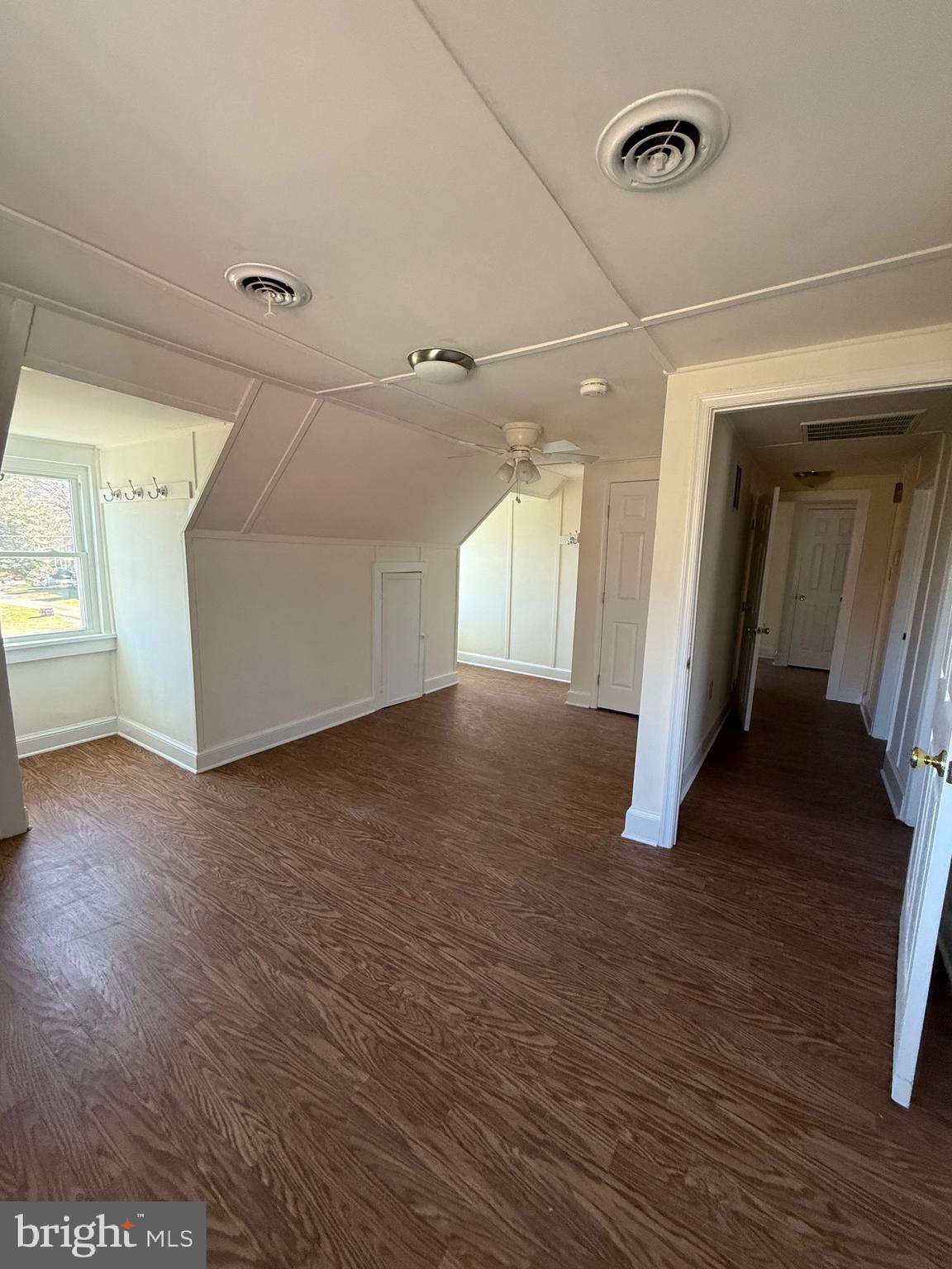 9253 Dahlgren Road King George, VA 22485 - Photo 16 of 23 a view of a hallway with wooden floor
