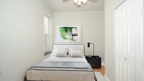 a view of small space with wooden floor
