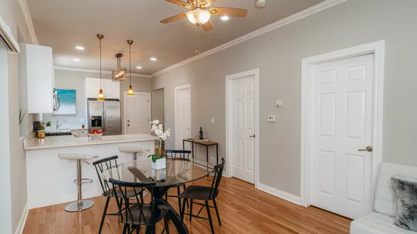 a kitchen with stainless steel appliances a sink stove and refrigerator