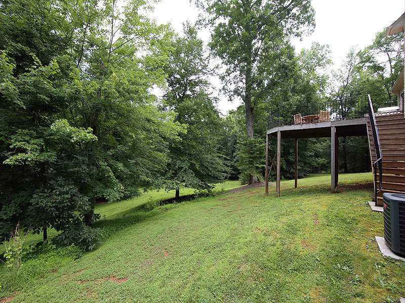 1313 Rhea Drive Garner, NC 27529 - Photo 22 of 25 A beautiful property! 1.95 acres. Partially cleared for your outdoor toys! Yard