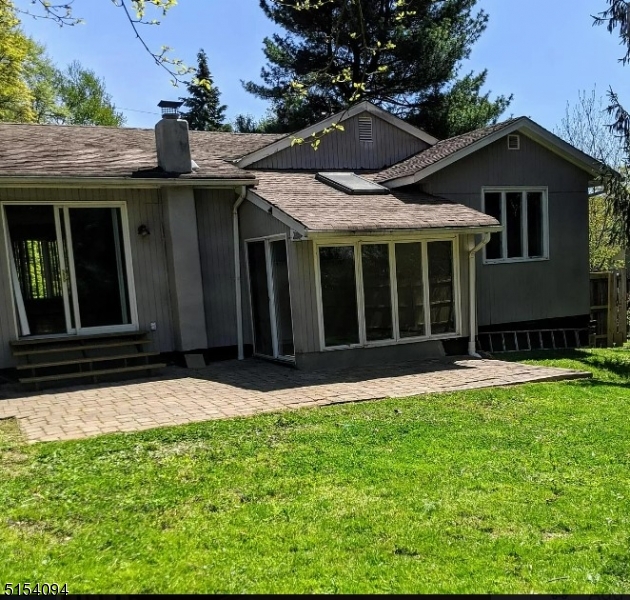 33 Roseland Avenue Warren, NJ 07059 - Photo 2 of 4 a view of a house with yard and tree