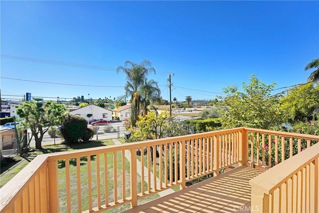 a view of a balcony with an outdoor space