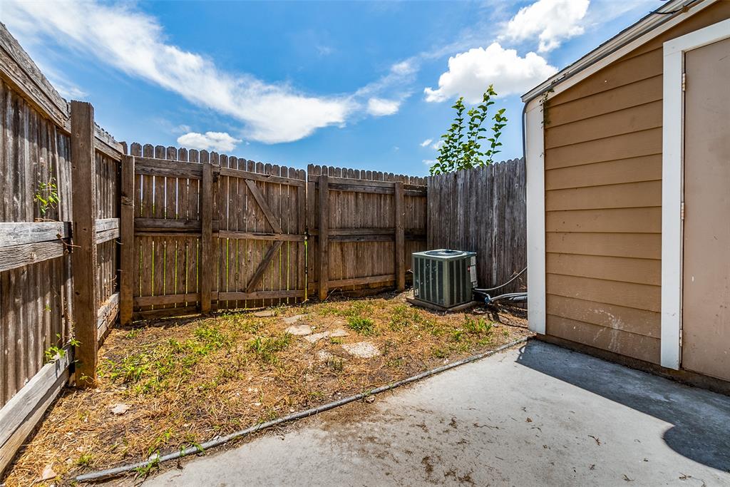 709 Lee Street, Unit 3 Mesquite, TX 75149 - Photo 9 of 9 a view of a backyard of the house