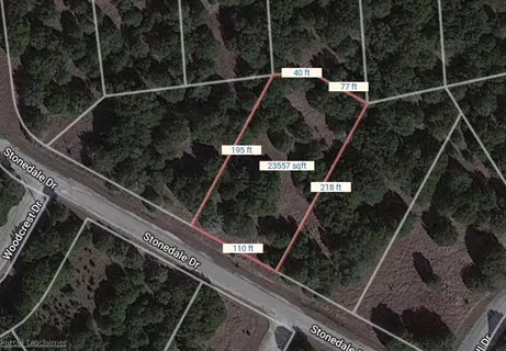 a front view of a building with garden