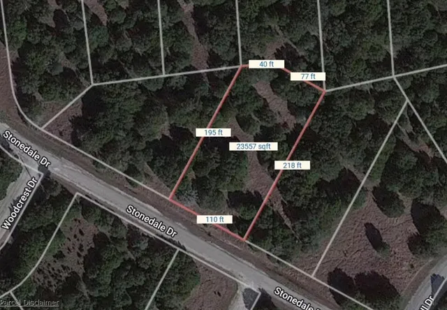 a front view of a building with garden