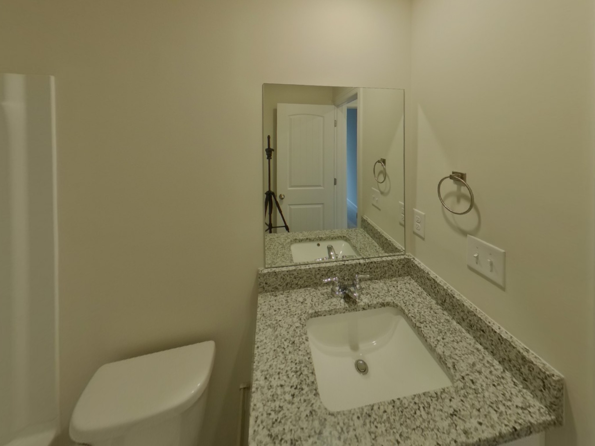 2404 Nabali Way Murfreesboro, TN 37127 - Photo 12 of 15 a bathroom with a granite countertop sink a toilet and mirror