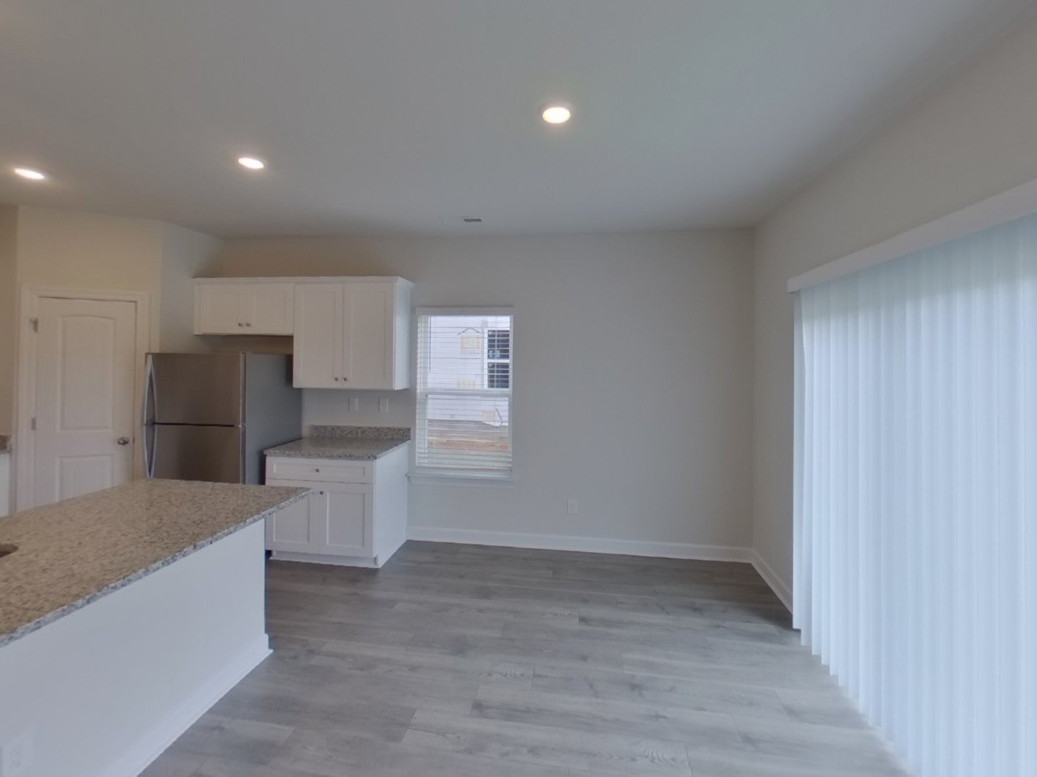 2404 Nabali Way Murfreesboro, TN 37127 - Photo 2 of 15 a view of a kitchen with refrigerator and microwave