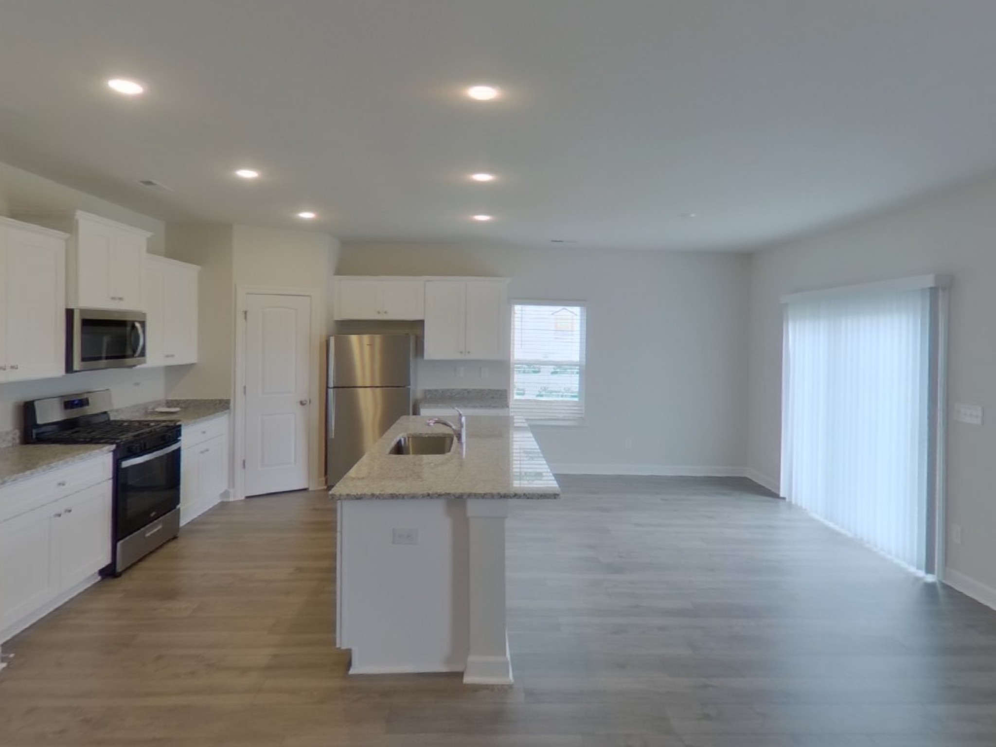 2404 Nabali Way Murfreesboro, TN 37127 - Photo 3 of 15 an empty room with windows and fireplace