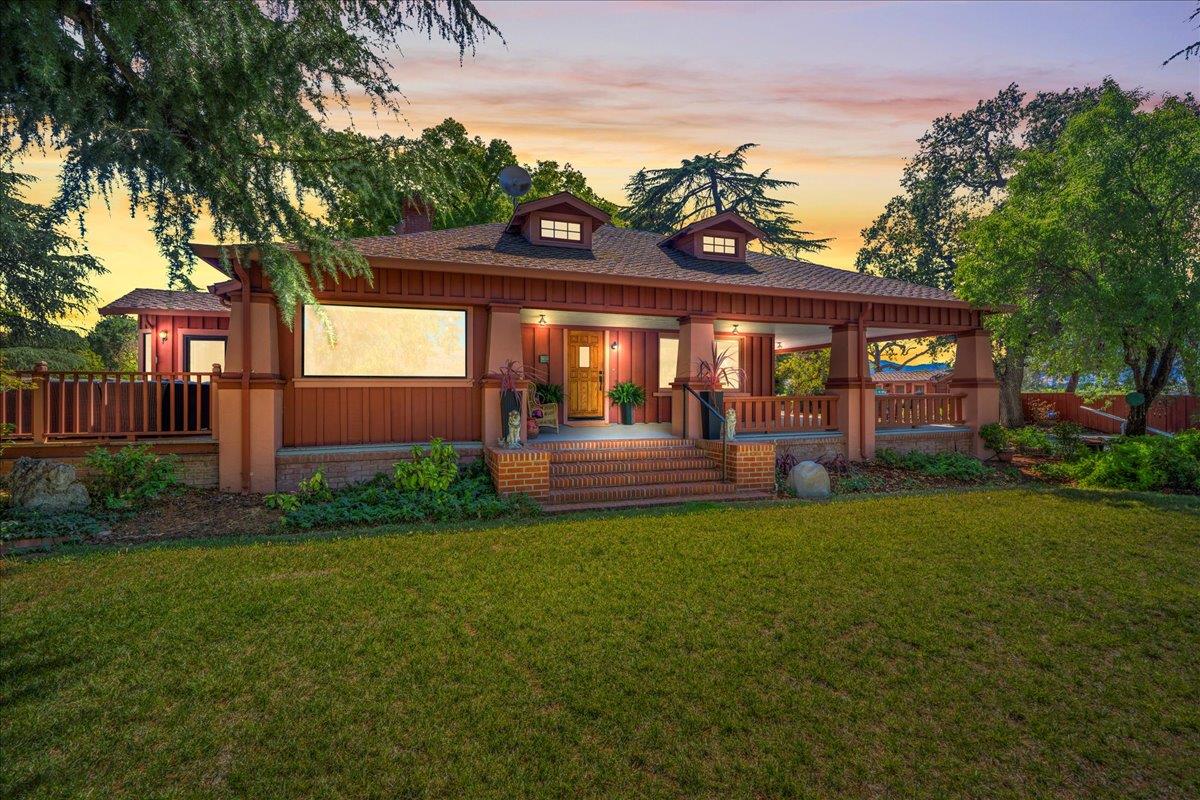14325 Monterey Road Morgan Hill, CA 95037 - Photo 2 of 41 a view of a house with backyard and porch