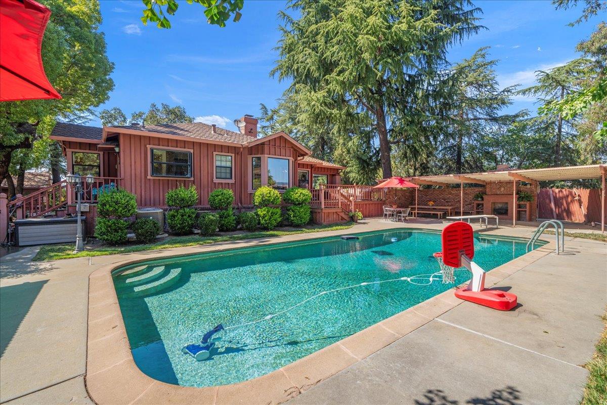 14325 Monterey Road Morgan Hill, CA 95037 - Photo 22 of 41 a view of a backyard with a garden and plants