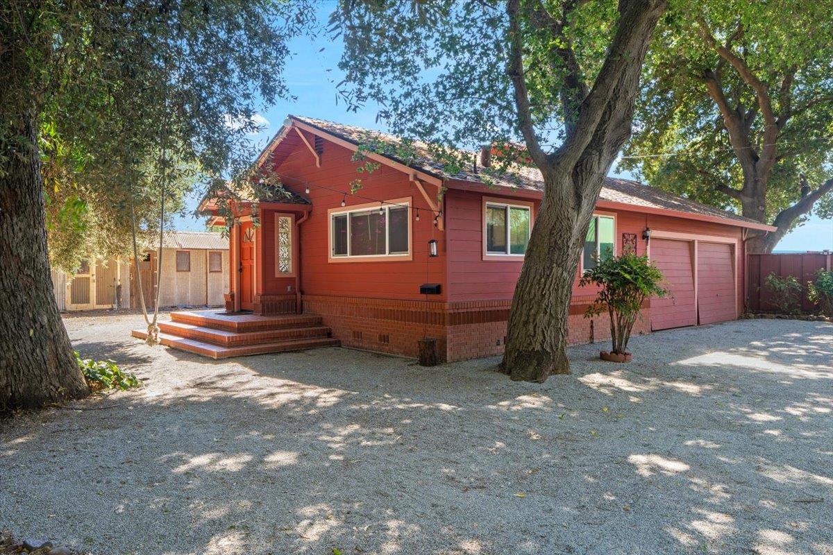 14325 Monterey Road Morgan Hill, CA 95037 - Photo 24 of 41 a house view with a backyard space