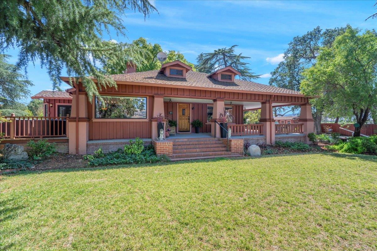 14325 Monterey Road Morgan Hill, CA 95037 - Photo 3 of 41 a view of a house with backyard and porch