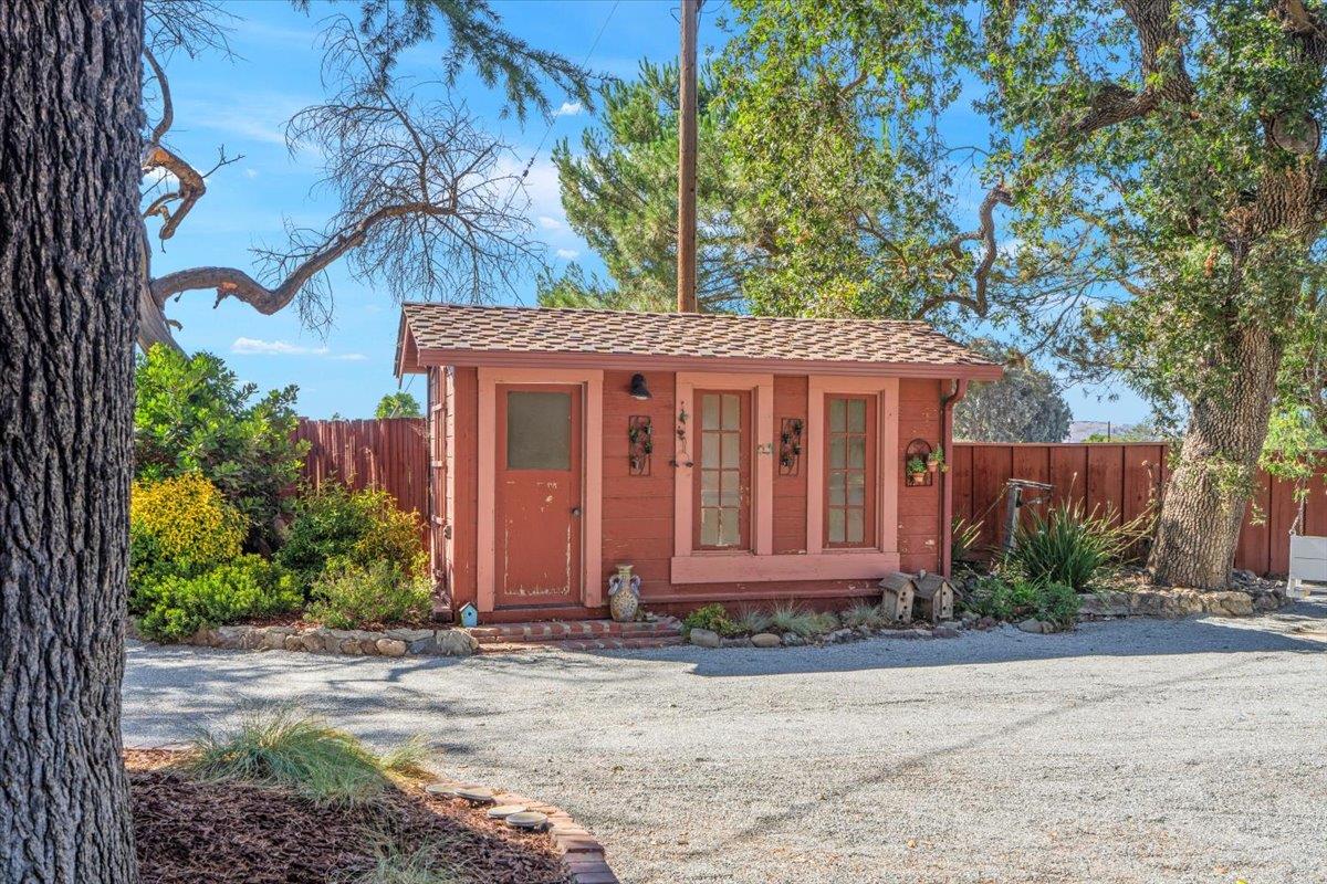14325 Monterey Road Morgan Hill, CA 95037 - Photo 35 of 41 a front view of a house with garden