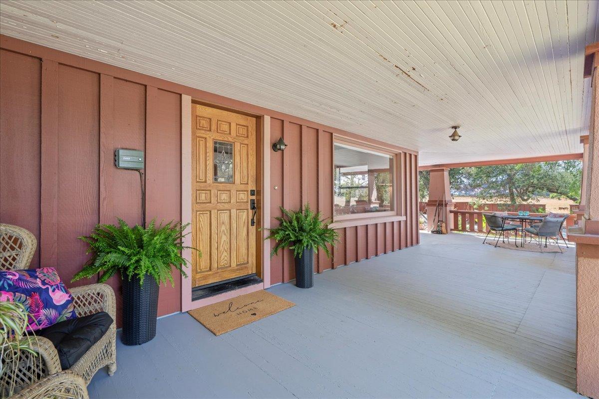 14325 Monterey Road Morgan Hill, CA 95037 - Photo 6 of 41 a view of an empty room with a window and potted plants