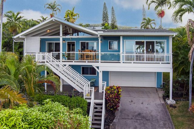 a front view of a house with balcony