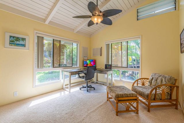 a room with furniture and a window