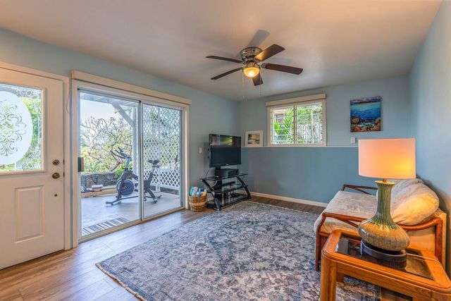 a bathroom with a sink a mirror and a shower