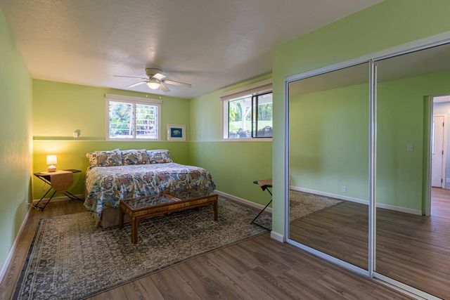 a room with lots of furniture and garden view