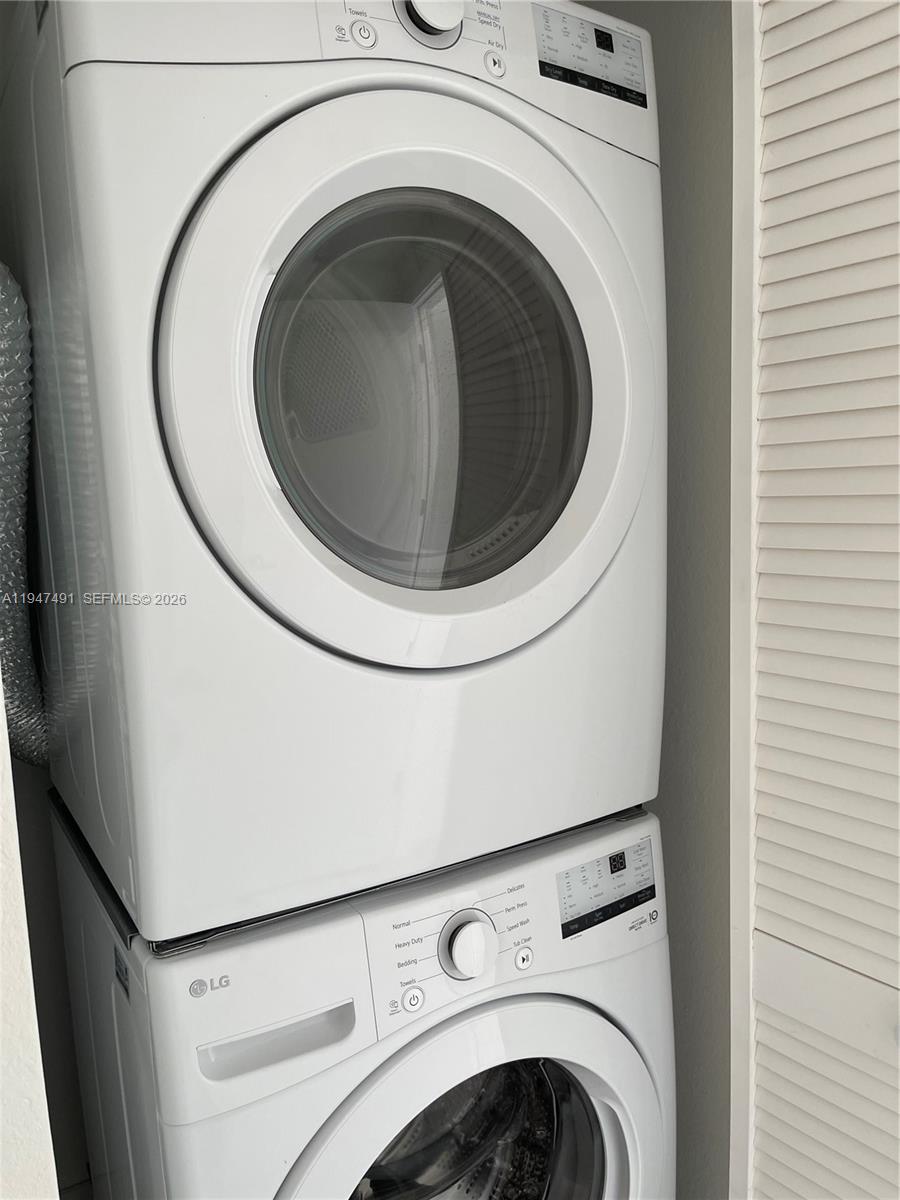 25822 Southwest 144th Court, Unit 25822 Homestead, FL 33032 - Photo 15 of 19 a close up view of a washer and dryer
