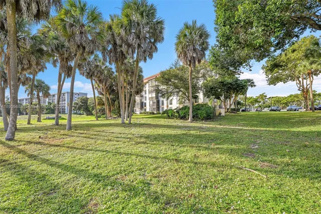a view of swimming pool with a yard