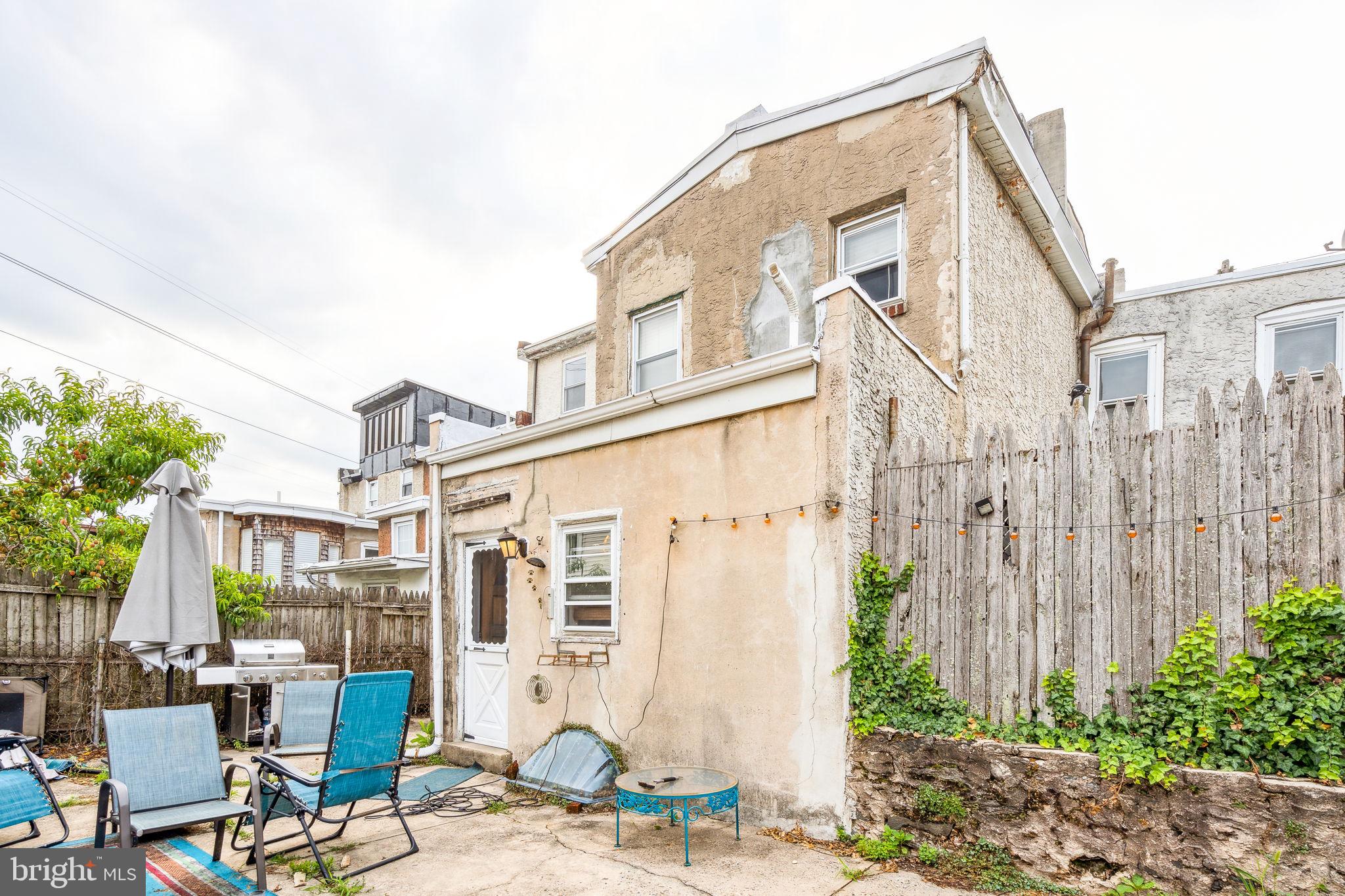 129 Gay Street, Unit 1 Philadelphia, PA 19127 - Photo 18 of 23 a view of a building with backyard and sitting area