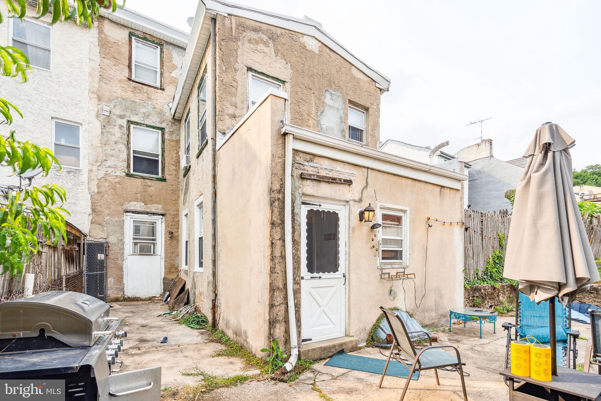 129 Gay Street, Unit 1 Philadelphia, PA 19127 - Photo 19 of 23 a view of a building with many windows