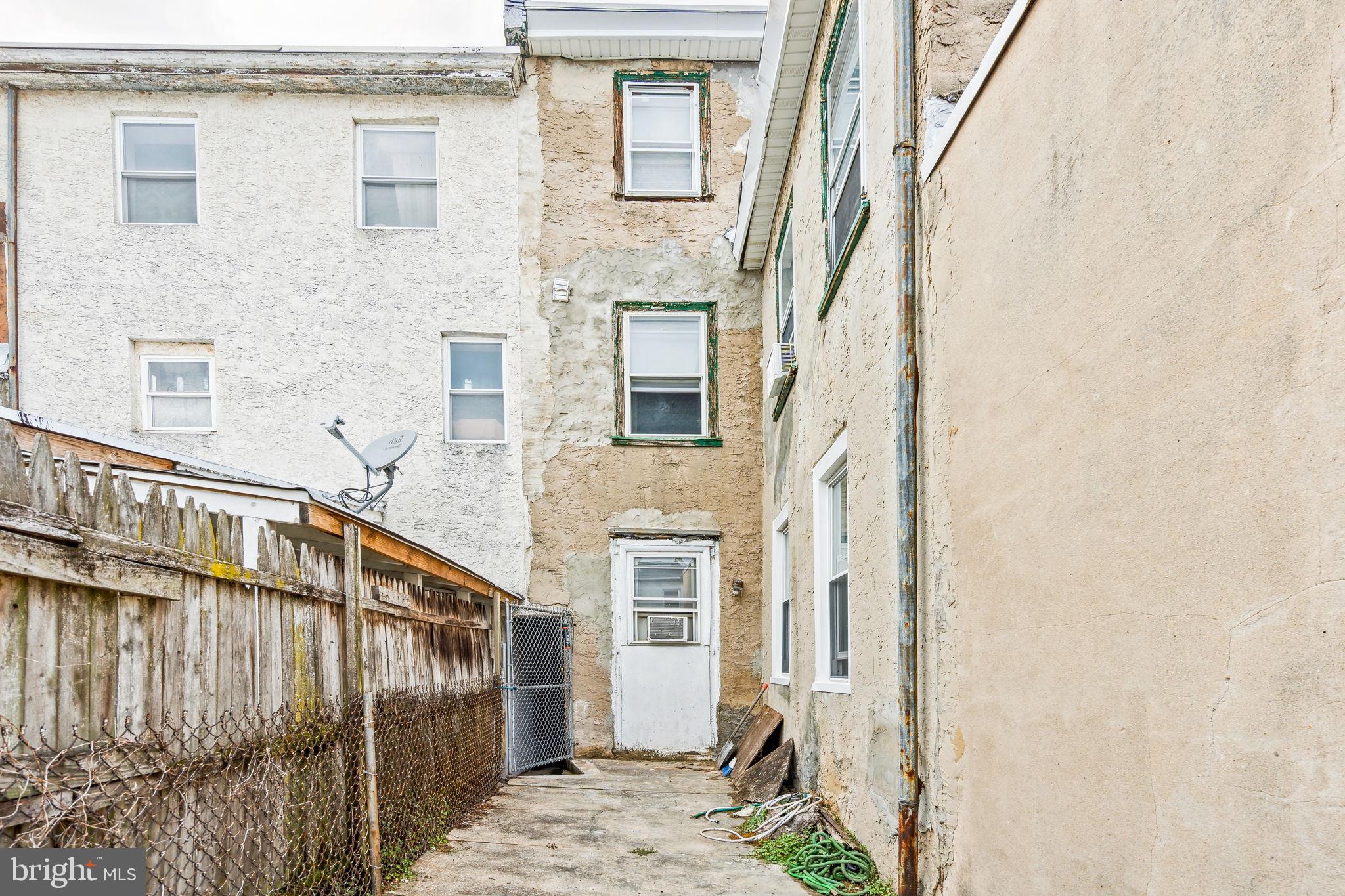 129 Gay Street, Unit 1 Philadelphia, PA 19127 - Photo 21 of 23 a view of a brick house with a small space