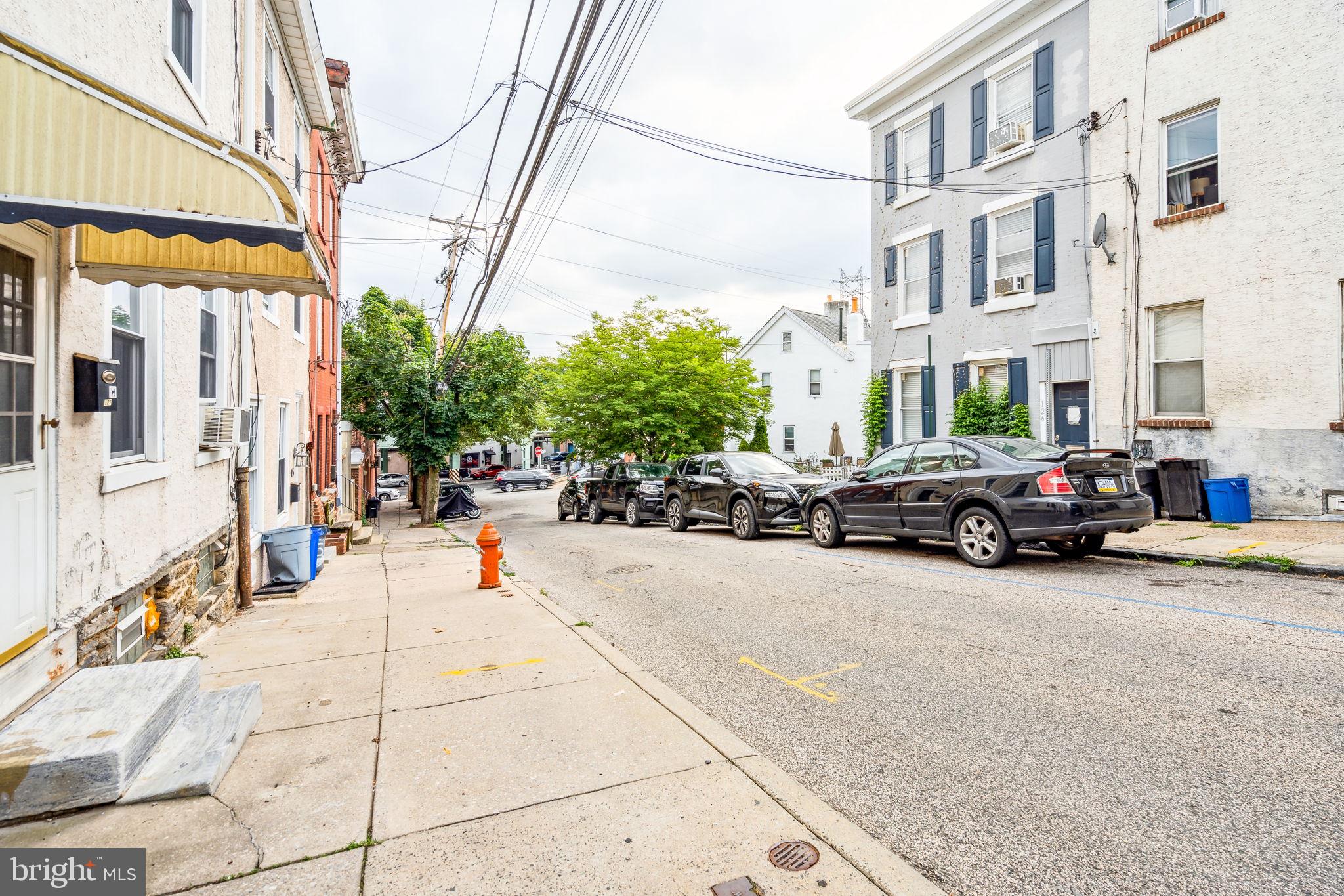 129 Gay Street, Unit 1 Philadelphia, PA 19127 - Photo 6 of 23 a building with cars parked in front of it