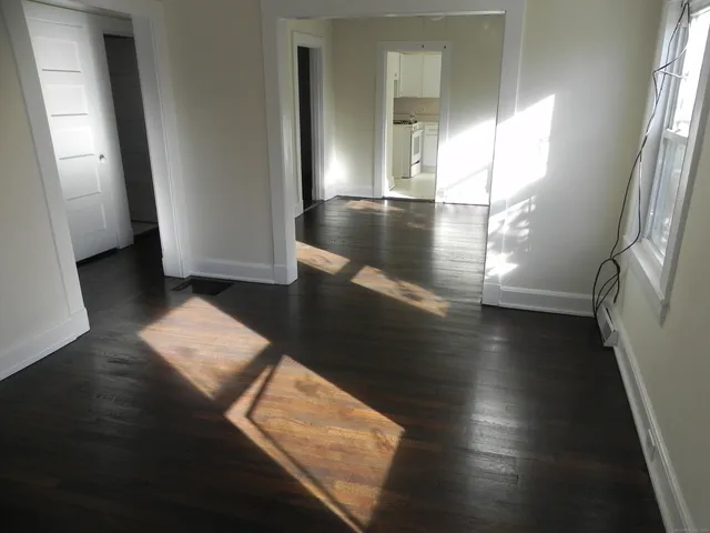 a view of an empty room and window