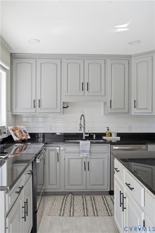 9207 Mapleway Road Richmond, VA 23229 - Photo 19 of 36 Kitchen featuring light-toned cabinetry with dark