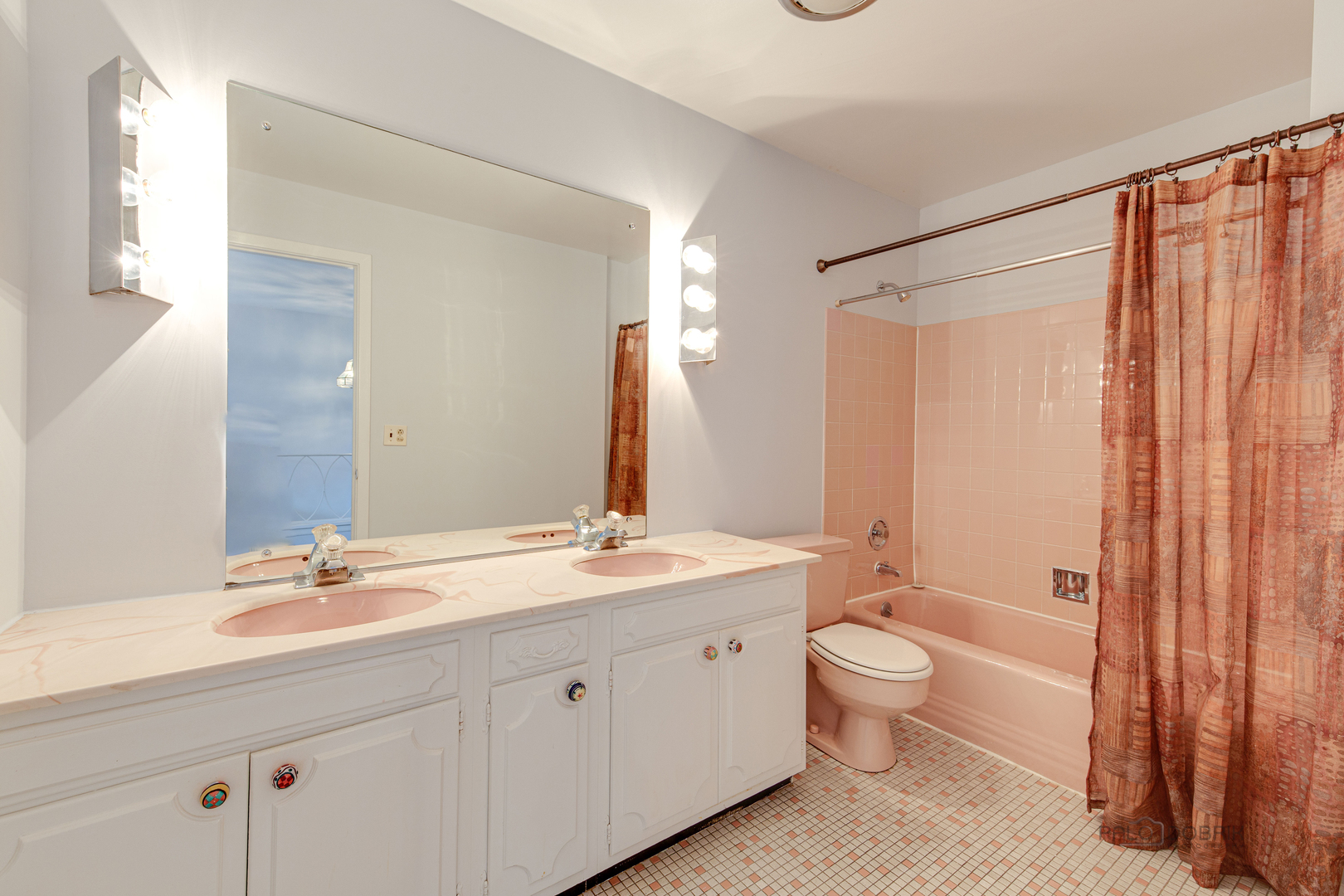 9747 Huber Ovl Niles, IL 60714 - Photo 22 of 38 a spacious bathroom with a double vanity sink toilet mirror and shower