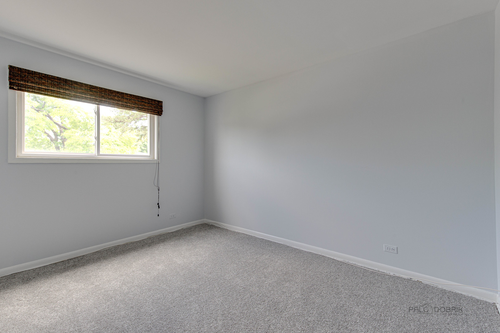 9747 Huber Ovl Niles, IL 60714 - Photo 24 of 38 an empty room with a window