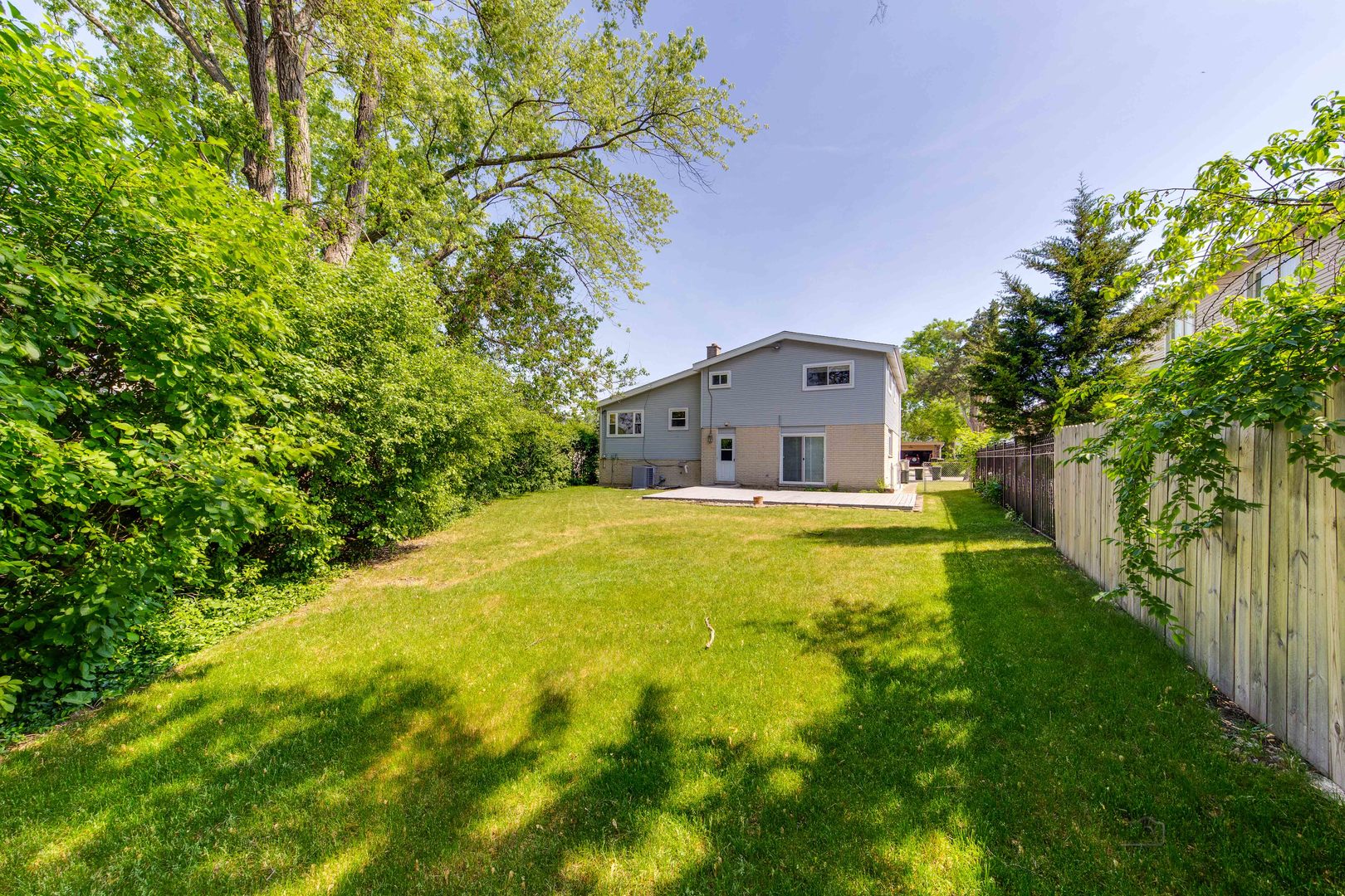 9747 Huber Ovl Niles, IL 60714 - Photo 38 of 38 a house with a yard